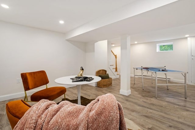 interior space with wood finished floors, baseboards, and recessed lighting