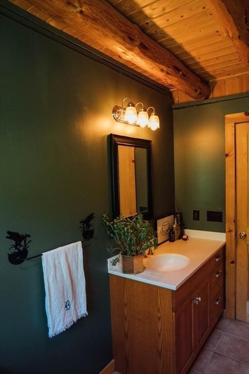 15 Stephanie Ln, Peru, MA 01235 - bathroom with wooden ceiling with exposed beams, vanity, and tile patterned flooring