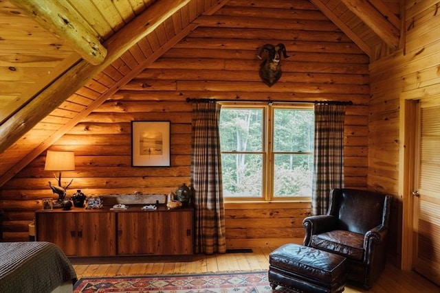 15 Stephanie Ln, Peru, MA 01235 - bedroom with light wood-style floors and log walls