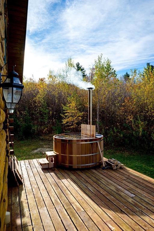 15 Stephanie Ln, Peru, MA 01235 - wooden deck featuring a hot tub
