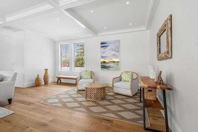 living area with hardwood / wood-style flooring, recessed lighting, baseboards, beam ceiling, and crown molding