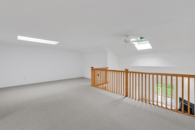84 Pine Grove Dr Unit 84, South Hadley, MA 01075 - bonus room featuring a skylight, a ceiling fan, vaulted ceiling, and carpet flooring