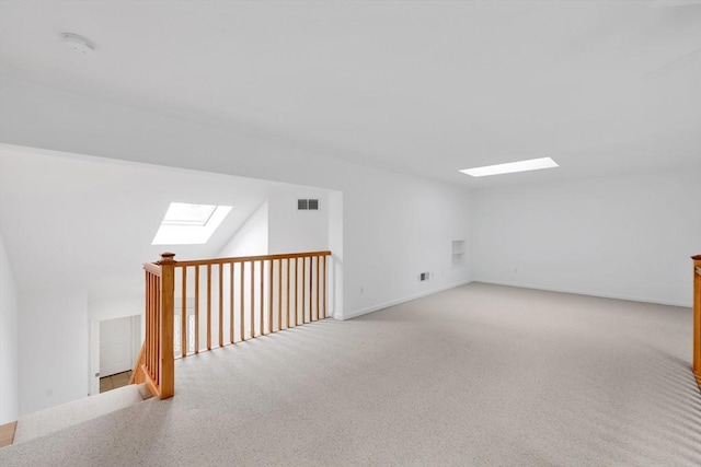 84 Pine Grove Dr Unit 84, South Hadley, MA 01075 - bonus room with a skylight and light carpet