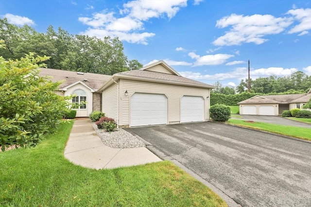 84 Pine Grove Dr Unit 84, South Hadley, MA 01075 - view of front of house featuring an attached garage and driveway