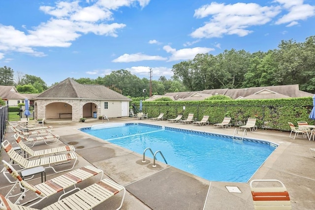 84 Pine Grove Dr Unit 84, South Hadley, MA 01075 - community pool with a patio area