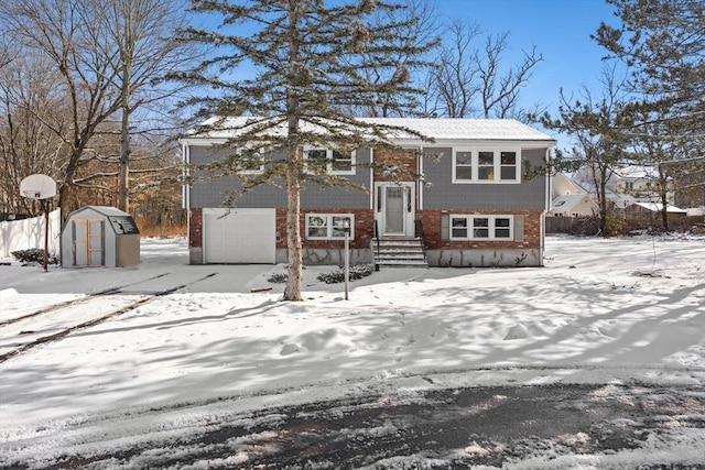 bi-level home featuring a garage and a shed