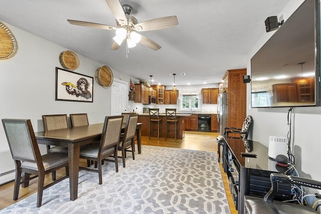 14 Harbor Light Rd, Leominster, MA 01453 - dining space with a ceiling fan and light wood-type flooring