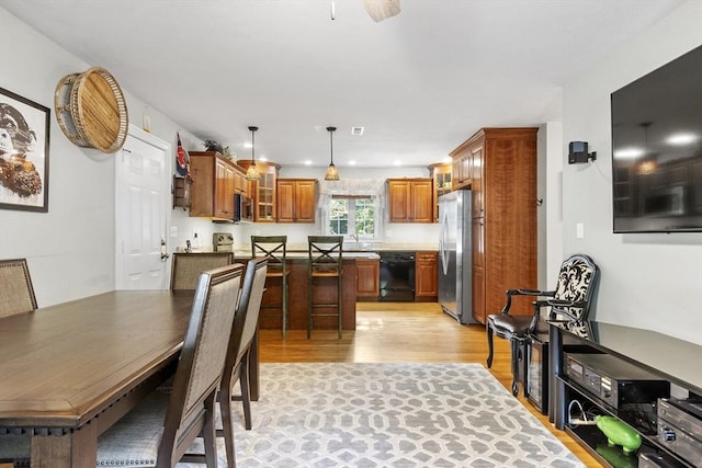 14 Harbor Light Rd, Leominster, MA 01453 - dining area featuring light wood-type flooring