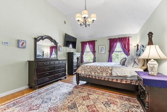 14 Harbor Light Rd, Leominster, MA 01453 - bedroom featuring a chandelier, light wood finished floors, and vaulted ceiling