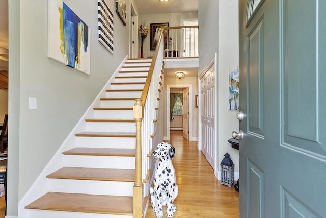 14 Harbor Light Rd, Leominster, MA 01453 - entrance foyer with stairway, healthy amount of natural light, light wood-style flooring, and a high ceiling