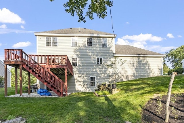 14 Harbor Light Rd, Leominster, MA 01453 - rear view of house with stairs, a deck, and a lawn