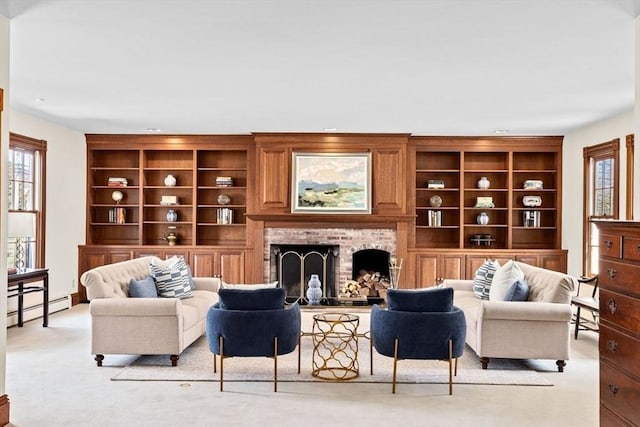 living area with a wealth of natural light, light colored carpet, a fireplace, and baseboard heating