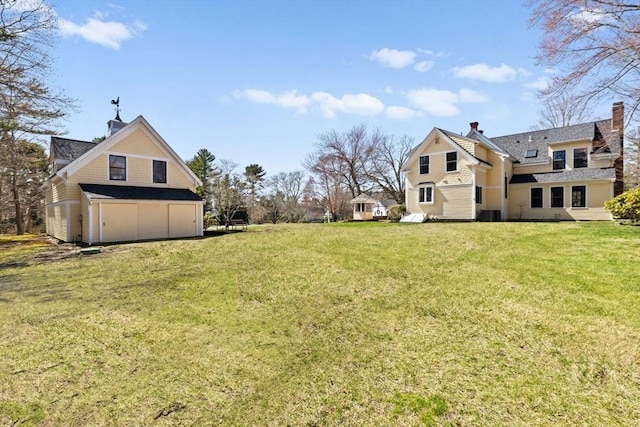 view of yard featuring a garage