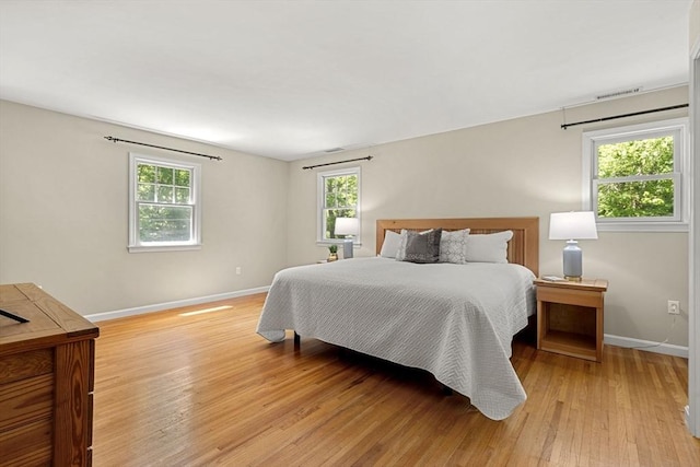 299 Reedy Meadow Rd, Groton, MA 01450 - bedroom featuring baseboards and light wood-type flooring