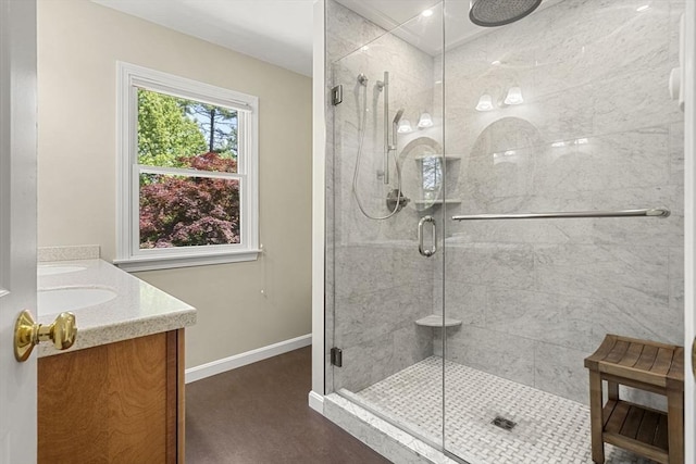 299 Reedy Meadow Rd, Groton, MA 01450 - full bath with double vanity, a stall shower, and baseboards