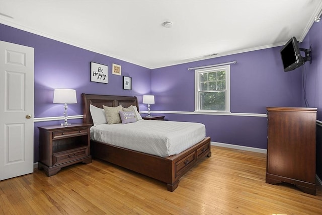 299 Reedy Meadow Rd, Groton, MA 01450 - bedroom with light wood-style flooring, crown molding, and baseboards