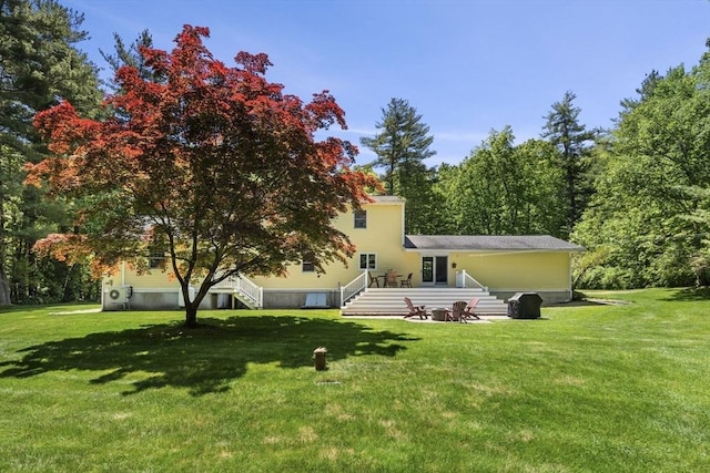 299 Reedy Meadow Rd, Groton, MA 01450 - back of house featuring a yard