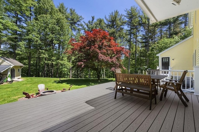 299 Reedy Meadow Rd, Groton, MA 01450 - wooden deck with a fire pit, a yard, and view of scattered trees