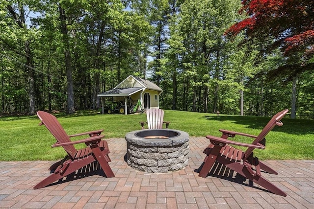 299 Reedy Meadow Rd, Groton, MA 01450 - view of patio featuring an outdoor fire pit and an outdoor structure