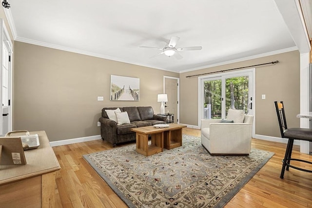 299 Reedy Meadow Rd, Groton, MA 01450 - living room with ceiling fan, crown molding, light wood finished floors, and baseboards