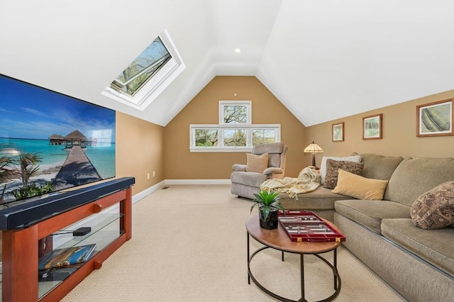 living area featuring baseboards, carpet, and lofted ceiling with skylight