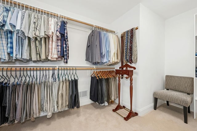 spacious closet featuring carpet floors and visible vents