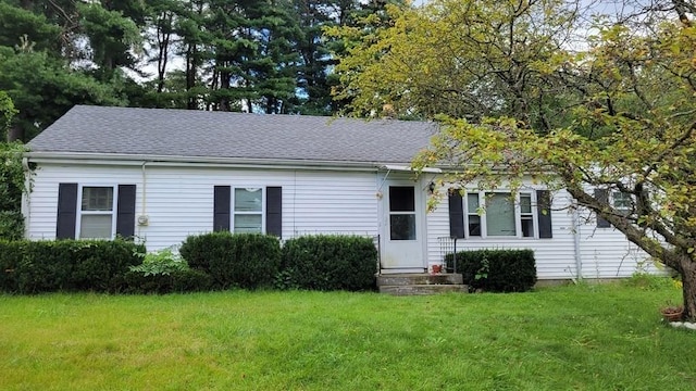 view of front of home with a front yard