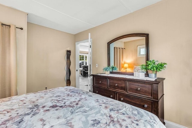 bedroom featuring arched walkways