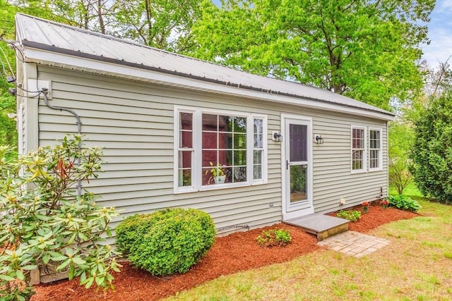 view of front of home featuring metal roof