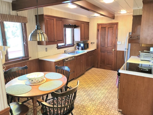 kitchen with beamed ceiling, sink, range, crown molding, and dishwasher