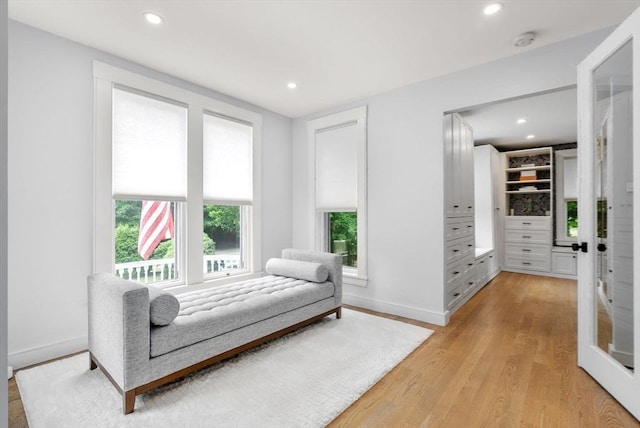 bedroom featuring light wood-style flooring, recessed lighting, and baseboards