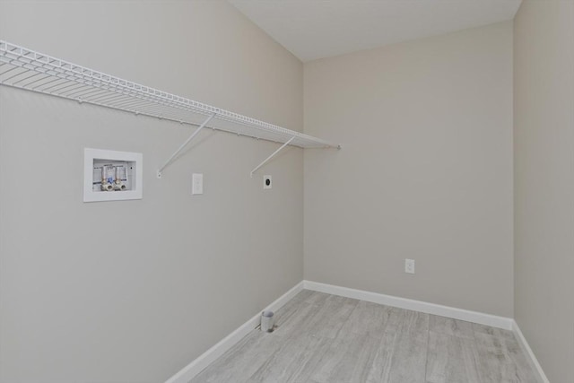 washroom featuring washer hookup, laundry area, hookup for an electric dryer, and baseboards