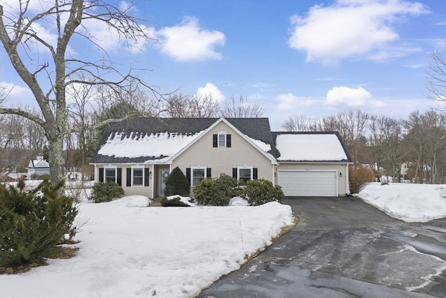 view of front of property featuring driveway and a garage