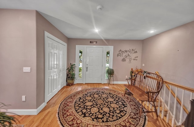 entrance foyer with light hardwood / wood-style flooring