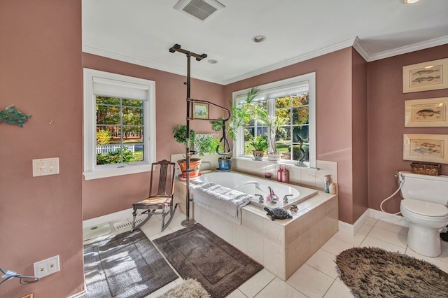 bathroom featuring toilet, a relaxing tiled tub, tile patterned floors, and crown molding