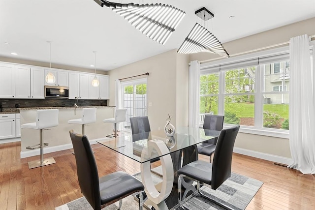 5 Manor Dr Unit B, Hooksett, NH 03106 - dining room featuring light wood-style flooring, baseboards, and recessed lighting