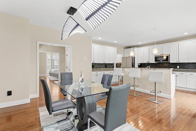 5 Manor Dr Unit B, Hooksett, NH 03106 - dining area featuring light wood-type flooring, baseboards, and recessed lighting