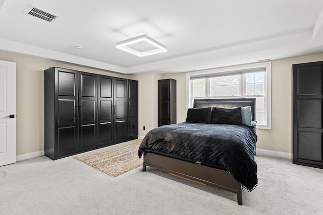 5 Manor Dr Unit B, Hooksett, NH 03106 - bedroom featuring light carpet, baseboards, and attic access