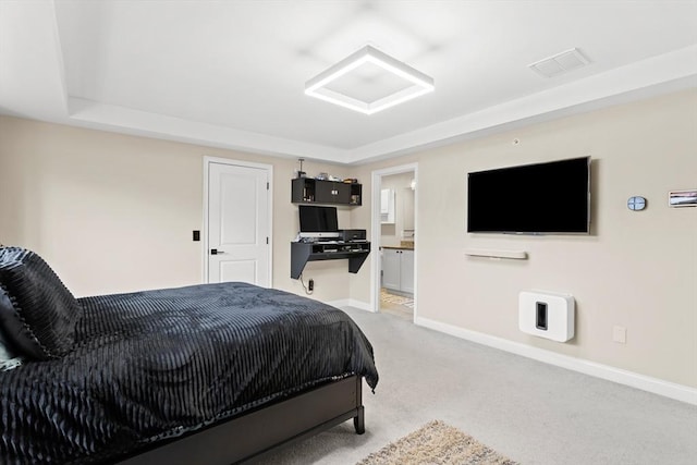 5 Manor Dr Unit B, Hooksett, NH 03106 - bedroom featuring light colored carpet, baseboards, and connected bathroom