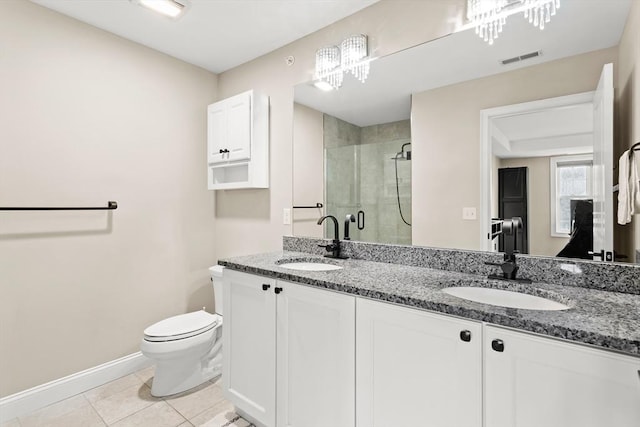 5 Manor Dr Unit B, Hooksett, NH 03106 - full bath featuring a stall shower, toilet, double vanity, baseboards, and tile patterned floors