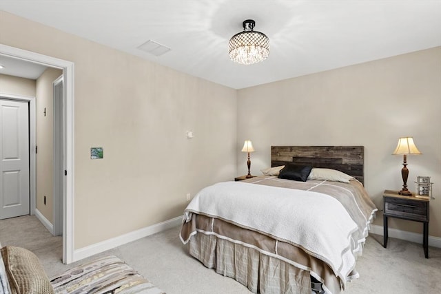 5 Manor Dr Unit B, Hooksett, NH 03106 - bedroom with light carpet, a chandelier, and baseboards