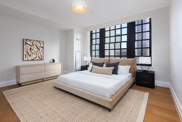 bedroom featuring hardwood / wood-style floors