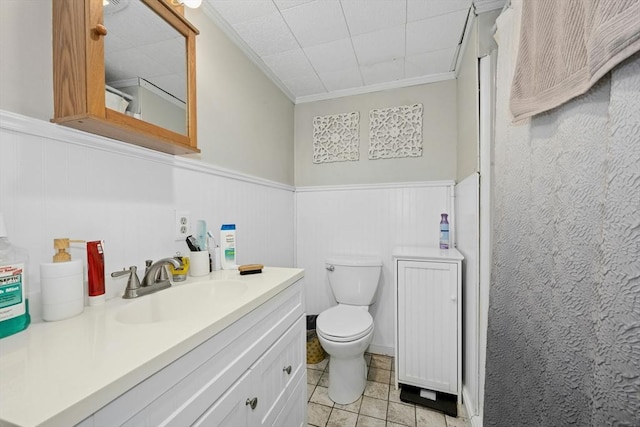 8 Stones Corner Rd, Berlin, MA 01503 - full bath with a wainscoted wall, vanity, a shower, ornamental molding, and tile patterned flooring