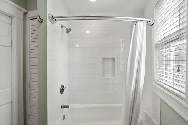 full bathroom featuring shower / tub combo with curtain