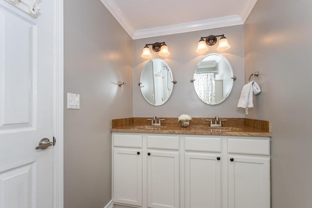 full bath with double vanity, ornamental molding, and a sink