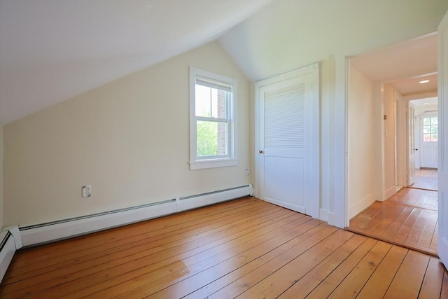 460 W Main Rd, Little Compton, RI 02837 - additional living space featuring hardwood / wood-style flooring, lofted ceiling, and a baseboard heating unit