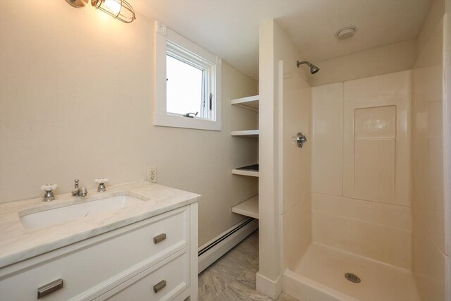 460 W Main Rd, Little Compton, RI 02837 - bathroom featuring baseboard heating, a shower, and vanity