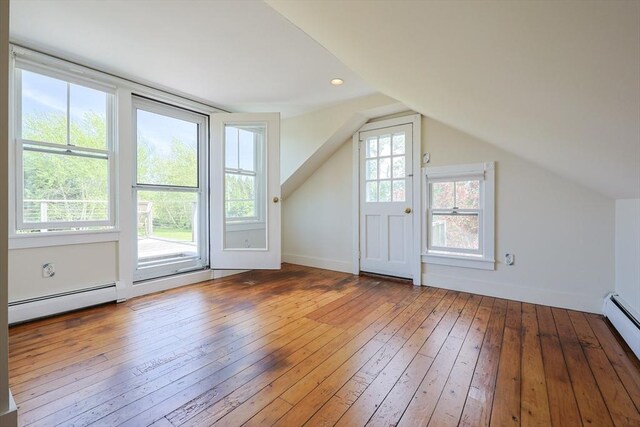 460 W Main Rd, Little Compton, RI 02837 - bonus room with a baseboard radiator, hardwood / wood-style flooring, vaulted ceiling, and baseboards