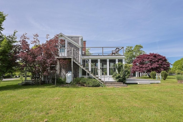 460 W Main Rd, Little Compton, RI 02837 - back of house with stairs, a yard, and a sunroom