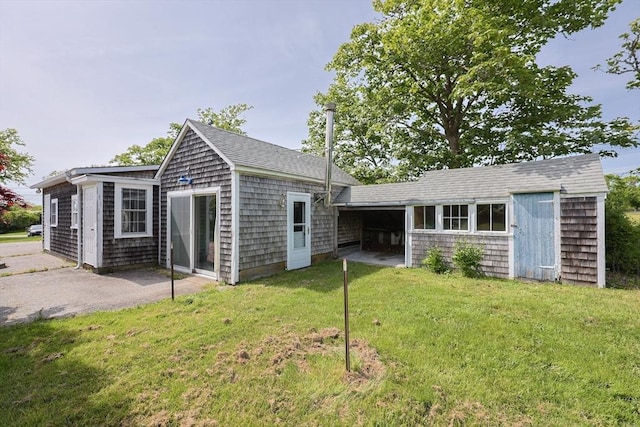460 W Main Rd, Little Compton, RI 02837 - rear view of property with a yard